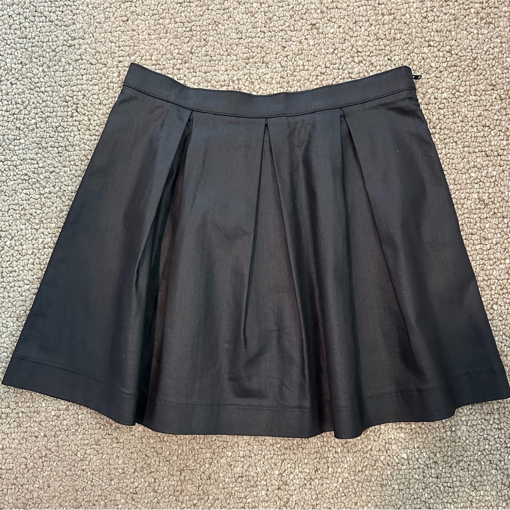 FC Jeans pleated skirt in soft black. Beautiful fabric with a sheen.